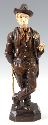 Lot 531 - AN EARLY 20th CENTURY GERMAN CARVED WOOD AND...