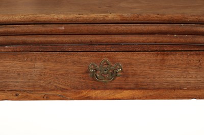 Lot 452 - A GEORGE II FIGURED MAHOGANY TRIPLE TOP FOLD-OVER GAMES TABLE