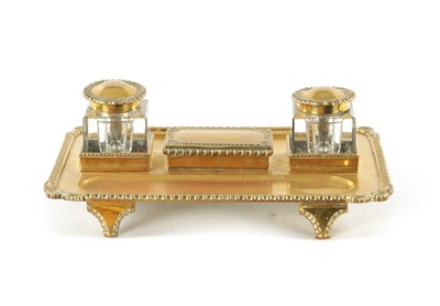 Lot 371 - A 19TH CENTURY BRASS DESKTOP INKWELL