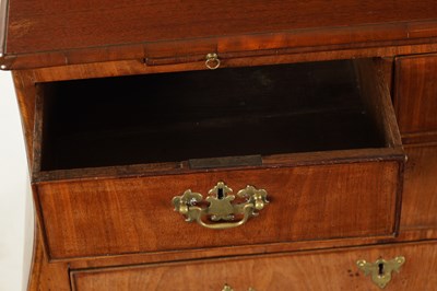Lot 169 - AN 18TH CENTURY FIGURED  MAHOGANY BOMBE SHAPED CHEST OF DRAWERS