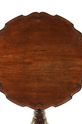 Lot 304 - AN 18TH CENTURY FIGURED MAHOGANY PIE CRUST TRIPOD TABLE ON MANX FEET