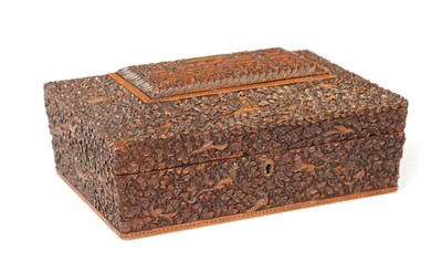 Lot 390 - A 19TH CENTURY INDIAN CARVED HARDWOOD SEWING BOX