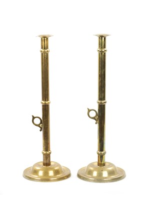 Lot 231 - A PAIR OF LARGE 19TH CENTURY BRASS EJECTOR 'PULPIT' BRASS CANDLESTICKS