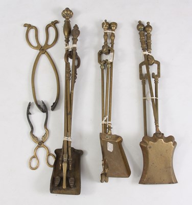 Lot 542 - A SELECTION OF 19th CENTURY BRASS FIRE IRONS...