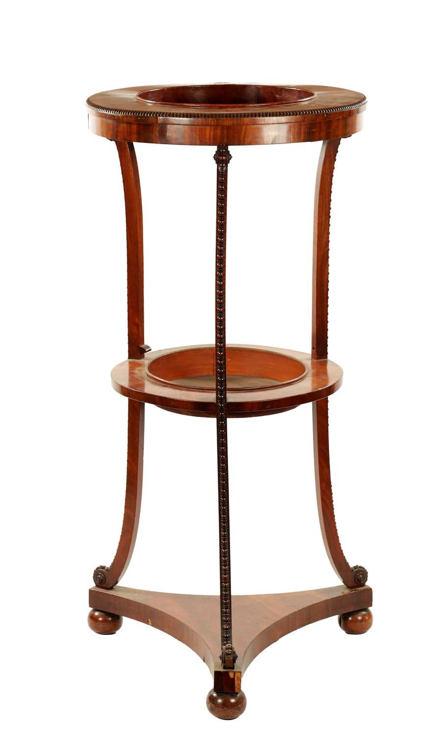 Lot 303 - A REGENCY TWO TIER MAHOGANY JARDINIERE STAND WITH BEADED DECORATION