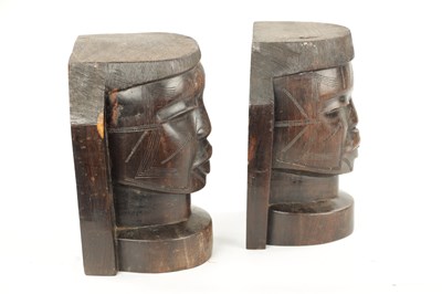 Lot 82 - A PAIR OF CARVED HARDWOOD NATIVE BOOKENDS