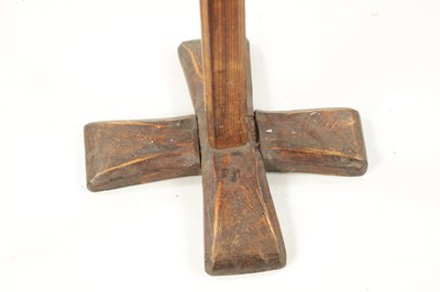 Lot 97 - AN 18TH CENTURY PINE AND WROUGHT IRON  RUSTIC CANDLESTICK ON STAND