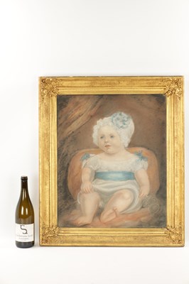 Lot 380 - A 19TH CENTURY PASTEL OF A SEATED CHILD WITH BONNET