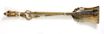 Lot 551 - A SET OF BRASS FIRE IRONS with spiral twist...