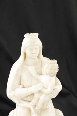 Lot 125 - A 17TH CENTURY CARVED WHITE MARBLE SCULPTURE OF MADONNA AND CHILD