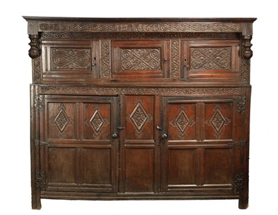 Lot 71 - A GOOD LATE 17TH CENTURY OVERSIZED CARVED OAK WESTMORLAND COURT CUPBOARD DATED 1673