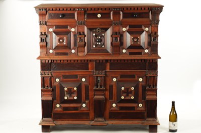 Lot 110 - A 17TH CENTURY TWO PART MOULDED FRONT YEW-WOOD, WALNUT  AND EBONY CHEST OF DRAWERS