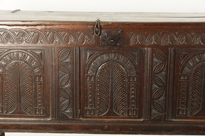 Lot 213 - A LARGE 17TH CENTURY CARVED THREE PANELLED OAK COFFER