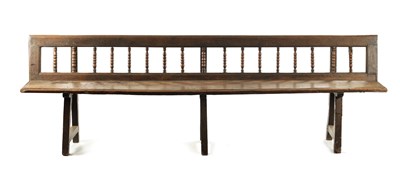 Lot 3 - AN EARLY 18TH CENTURY OAK SPINDLE BACK BENCH