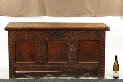 Lot 109 - A LATE 17TH CENTURY CARVED OAK THREE PANELLED COFFER