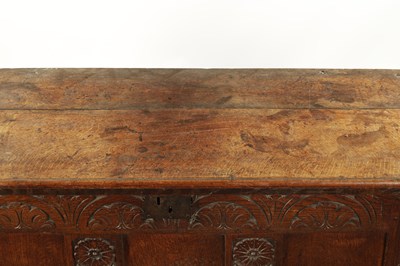 Lot 109 - A LATE 17TH CENTURY CARVED OAK THREE PANELLED COFFER