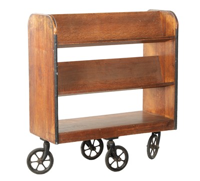 Lot 312 - AN EDWARDIAN OAK LIBRARY BOOKCASE ON WHEELS