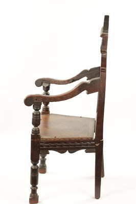 Lot 55 - A 17TH CENTURY CARVED OAK WAINSCOT CHAIR