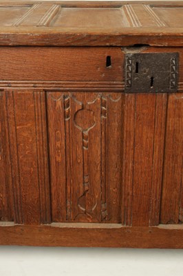 Lot 444 - A 17TH CENTURY CARVED OAK LINEN FOLD COFFER