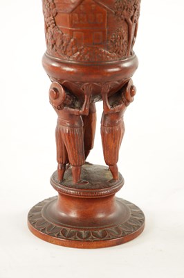 Lot 376 - A FINE 19TH CENTURY BAVARIAN LINDEN-WOOD CARVED TREEN CHALIS AND COVER