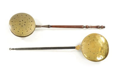 Lot 284 - A 17TH CENTURY BRASS WARMING PAN AND AN 18TH CENTURY BRASS PIERCED WARMING PAN