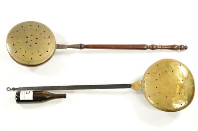 Lot 284 - A 17TH CENTURY BRASS WARMING PAN AND AN 18TH CENTURY BRASS PIERCED WARMING PAN