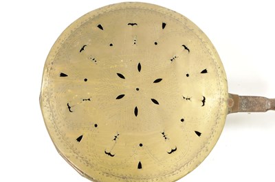 Lot 284 - A 17TH CENTURY BRASS WARMING PAN AND AN 18TH CENTURY BRASS PIERCED WARMING PAN