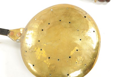 Lot 284 - A 17TH CENTURY BRASS WARMING PAN AND AN 18TH CENTURY BRASS PIERCED WARMING PAN