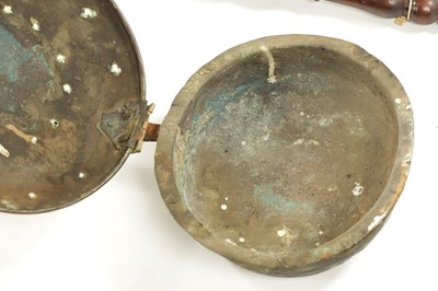 Lot 284 - A 17TH CENTURY BRASS WARMING PAN AND AN 18TH CENTURY BRASS PIERCED WARMING PAN