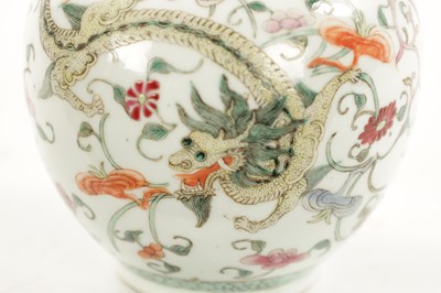 Lot 555 - A 19TH CENTURY CHINESE FAMILLE ROSE BULBOUS VASE OF SMALL SIZE