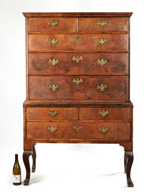 Lot 1446 - AN 18TH CENTURY FIGURED WALNUT CHEST ON STAND