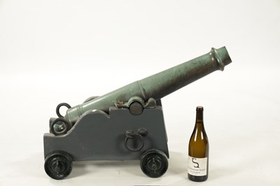 Lot 820 - A 19TH CENTURY GREEN PATINATED SIGNALLING CANON
