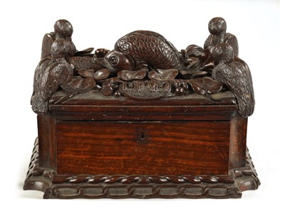 Lot 1039 - AN IMPRESSIVE 18TH CENTURY CONTINENTAL CARVED HARDWOOD TABLE CASKET