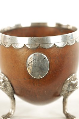 Lot 1093 - AN 18TH CENTURY SILVER MOUNTED CARVED COCONUT CUP