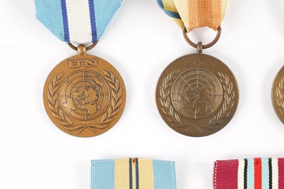 Lot 846 - A COLLECTION OF NINE UN SERVICE OF PEACE MEDALS