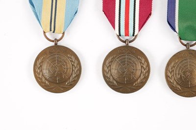 Lot 846 - A COLLECTION OF NINE UN SERVICE OF PEACE MEDALS