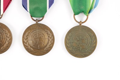 Lot 846 - A COLLECTION OF NINE UN SERVICE OF PEACE MEDALS