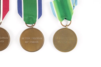 Lot 846 - A COLLECTION OF NINE UN SERVICE OF PEACE MEDALS