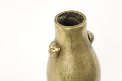 Lot 574 - AN 18TH / 19TH CENTURY MINIATURE CHINESE BRONZE VASE
