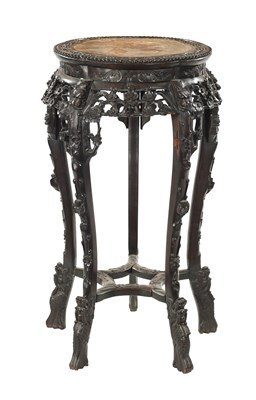Lot 529 - A 19TH CENTURY CHINESE CARVED HARDWOOD JARDINIERE STAND
