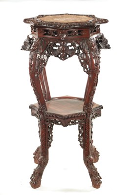 Lot 605 - A 19TH CENTURY CHINESE CARVED HARDWOOD JARDINIERE STAND