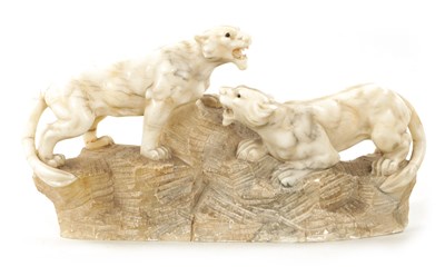 Lot 1012 - A 19TH CENTURY CARVED ALABASTER SCULPTURE OF TWO LIONS