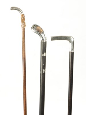 Lot 763 - OF GOLFING INTEREST, A COLLECTION OF THREE 19TH CENTURY SILVER TOPPED WALKING STICKS