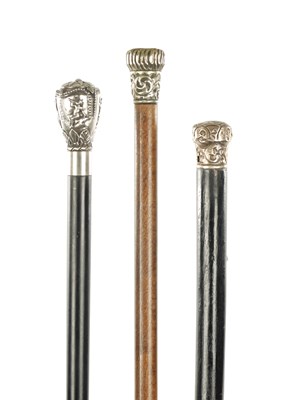 Lot 756 - A COLLECTION OF THREE LATE 19TH CENTURY SILVER TOPPED WALKING STICKS