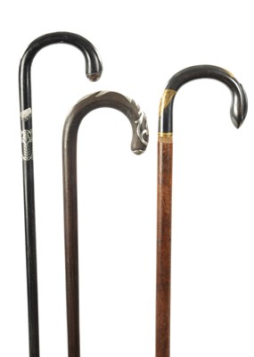 Lot 759 - A COLLECTION OF THREE LATE 19TH CENTURY INLAID WALKING STICKS