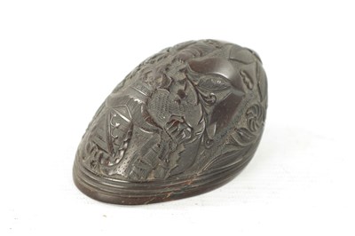 Lot 975 - A 19TH CENTURY CARVED COCONUT BUGBEAR