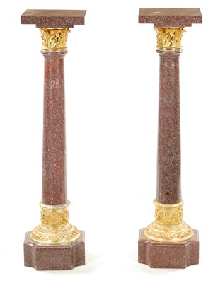 Lot 1004 - A PAIR OF 20TH CENTURY PORPHYRY TYPE AND ORMOLU MOUNTED COLUMNS