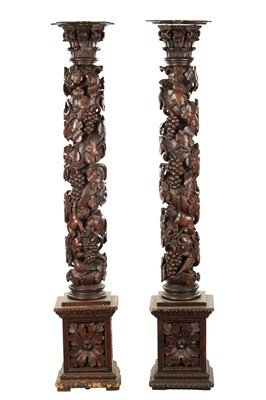 Lot 1454 - A PAIR OF LARGE 18TH / 19TH CENTURY CARVED WALNUT BARLEY TWIST COLUMNS