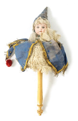 Lot 999 - A LATE 19TH CENTURY BISQUE SOCKET HEAD DOLL / JESTER