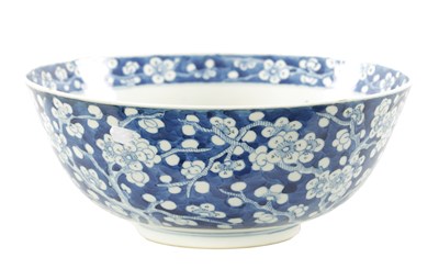 Lot 570 - A LARGE 19TH CENTURY CHINESE BLUE AND WHITE PORCELAIN PRUNUS BOWL